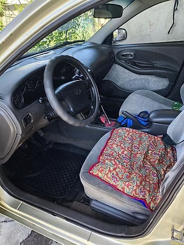 Транспорт: Daewoo Leganza: 1998 г., 1.8 л, Седан — 5