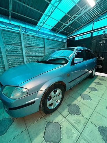 мазда хронос: Mazda 323: 2000 г., 1.5 л, Механика, Бензин, Хэтчбэк — 8