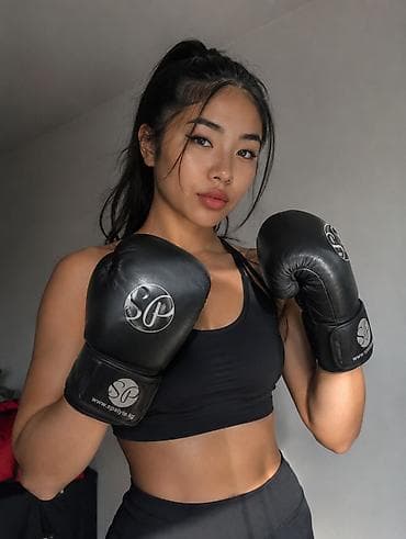 дордой одежды: Пара черных боксерских перчаток Sport Style.kg, подходящих для — 1