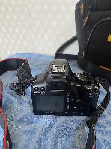 Техника и электроника: Зеркальная камера Canon EOS 1000D с комплектным объективом и сумкой — 2
