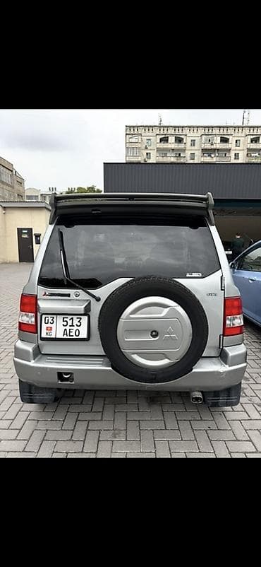 Транспорт: Mitsubishi Pajero iO: 1999 г., 1.8 л, Автомат, Бензин, Кроссовер — 5