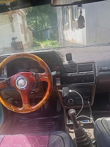 Унаа сатуу: Mazda 323: 1986 г., 1.5 л, Кол менен иштөөчү, Бензин, Седан — 5