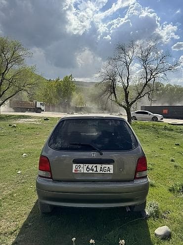 raf simons: Honda Logo: 2001 г., 1.3 л, Автомат, Бензин, Хэтчбэк — 6