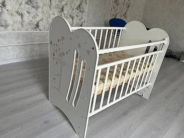 Детский мир: Детская кроватка-манеж из дерева. - Размер спального места — 2