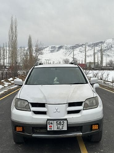 Mitsubishi Airtrek: 2003 г., 2.4 л, Автомат, Бензин, Кроссовер — 1