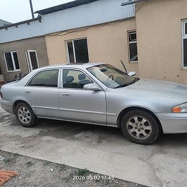 mazda 121: Mazda 626: 2001 г., 2 л, Автомат, Седан — 3