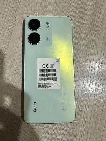 Redmi 13C, цвет мятный (задняя панель с градиентом), с двумя крупными at lalafo.kg Redmi 13C, цвет мятный (задняя панель с градиентом), с двумя крупными