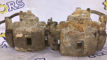 калотка хонда фит: Передний левый суппорт Mazda — 1