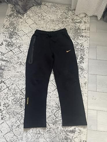 tech flees: Черные спортивные брюки Nike x NOCTA. - Цвет: черный с желтыми — 1