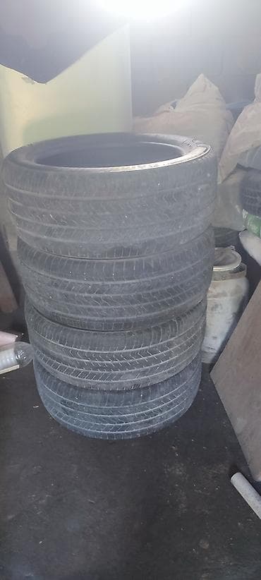 диске: Шины 285 / 45 / R 21, Всесезонная, Комплект, Внедорожные (АТ/МТ), Bridgestone — 1