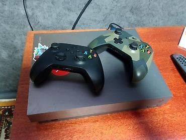 автомагнитола с двд: Игровая консоль Xbox One X (1 ТБ) с двумя беспроводными геймпадами — 3
