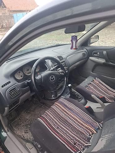 Mazda: Mazda 323: 2002 г., 1.6 л, Механика, Бензин, Хэтчбэк — 2