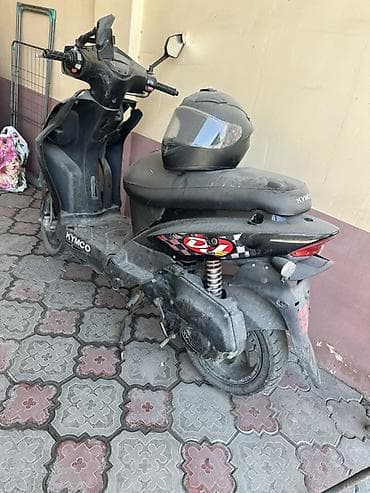 мото скупка: Скутер KYMCO, черный цвет, городской класс. Основное: - Бензиновый — 5