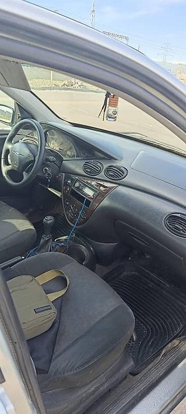 лада четырка: Ford Focus: 1999 г., 1.6 л, Механика, Бензин, Седан — 5