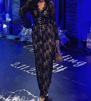 Жынсылар: Элегантное черное кружевное платье миди — 1