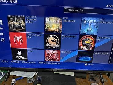 Продаю ps4 slim прошитая с играми на 1тб