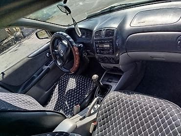 демио некся: Mazda 323: 2002 г., 1.6 л, Механика, Бензин, Седан — 4