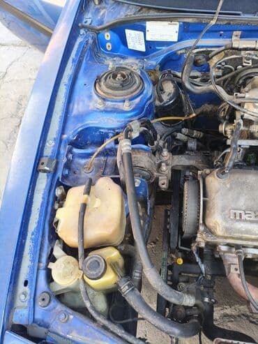 шины дордой: Mazda 323: 1989 г., 1.6 л, Автомат, Бензиновая, Хэтчбэк — 14