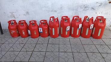 Композитные газовые баллоны красного цвета для пропан-бутана. - — 1