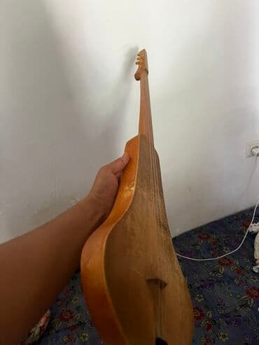 домбра комуз: Казахский щипковый инструмент — домбра - Корпус грушевидной формы — 1