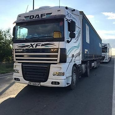 forester 2004: Тягач, DAF, 2000 г., Тентованный — 1