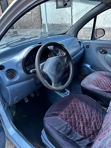 баа: Daewoo Matiz: 1999 г., Кол менен иштөөчү, Хетчбек — 4