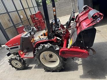 Мини-тракторы YANMAR: Мини-трактор Yanmar Ke-16 с почвофрезой Yanmar Описание: - Компактный — 3