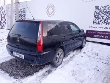 Продажа авто: Mitsubishi Lancer: 2003 г., 2 л, Механика, Бензин, Универсал — 4