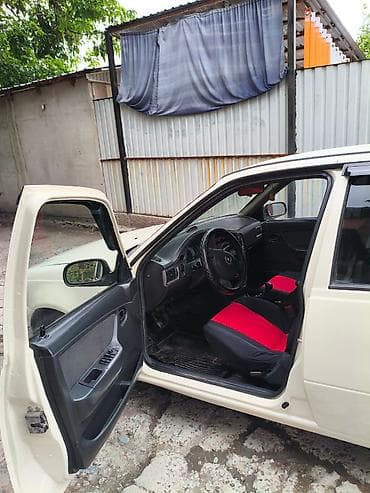 Унаа: Daewoo Nexia: 2010 г., 1.6 л, Кол менен иштөөчү, Бензин, Седан — 5