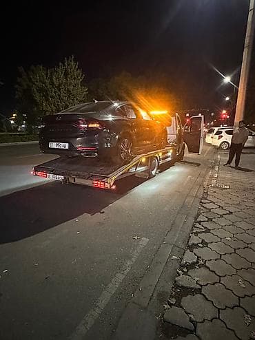 Услуги эвакуатора: С лебедкой, С ломаной платформой, Со сдвижной платформой — 1