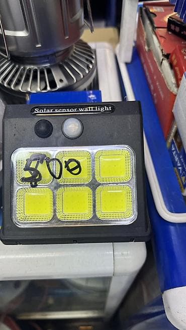 Светильник настенный с солнечной панелью и датчиком движения (Solar