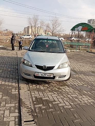 Mazda Demio: 2003 г., 1.3 л, Автомат, Бензин, Хэтчбэк