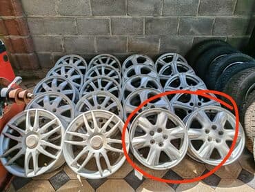 купить диски штампованные: Предлагается комплект автомобильных колёс, состоящий из шин и литых — 22