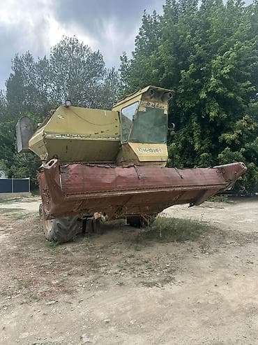 кун ковша: Комбайн зерноуборочный «Нива» СК-5М с жаткой + прицепная рама/тележка — 3