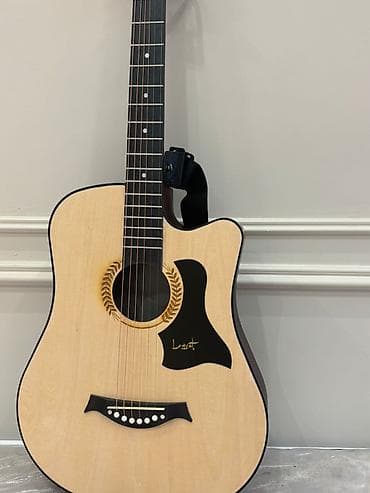 Гитары: Гитара акустическая новая, 39 размер. Цена: Договорная (до 2к) В — 1