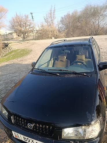 Mazda Demio: 1999 г., 1.5 л, Универсал