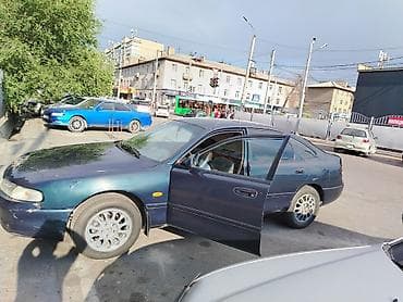 mini coper: Mazda 626: 1995 г., 1.8 л, Механика, Бензин, Седан — 4