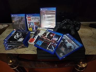 суу матор: Игровая консоль Sony PlayStation 4 (черная, серия Pro) с комплектом — 3