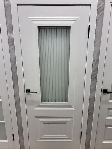 Межкомнатные двери в классическом стиле, белого цвета. Особенности: -