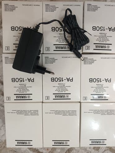 Адаптер переменного тока, предназначенный для питания различных