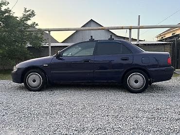 муссо автомобиль: Mitsubishi Carisma: 2000 г., Газ, Седан — 8