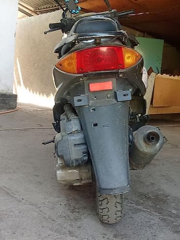Скутеры: Скутер Yamaha Jog (серия Jog) - Кузов типа «scooter» с центральной и — 1