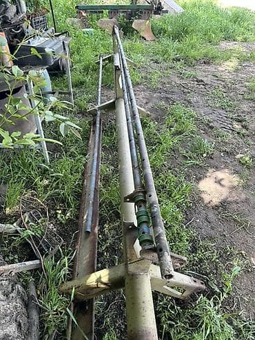 От Ешка Е-302 е303 жатка находится в Кемине