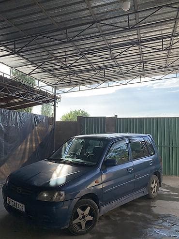 Унаа: Mazda Demio: 2002 г., 1.3 л, Кол менен иштөөчү, Бензин, Хетчбек — 10