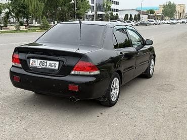 camry 2010: Mitsubishi Lancer: 2006 г., Автомат, Бензин, Седан — 3