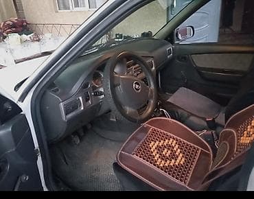 тез арада: Daewoo Nexia: 2009 г., 1.6 л, Кол менен иштөөчү, Бензин, Седан — 3