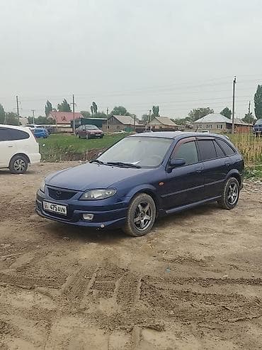 bme e34: Mazda Familia: 2002 г., 1.6 л, Ручные, Универсал — 4