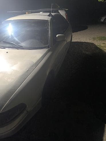 задняя крыло: Mazda 626: 1993 г., Механика, Бензин, Седан — 5