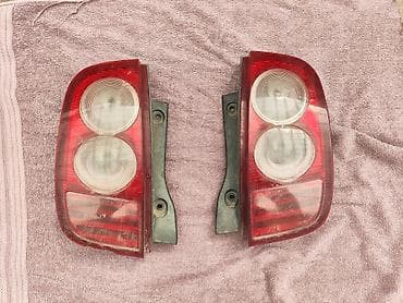Продаю задние фары на Ниссан Марч к12 все вопросы по телефону либо