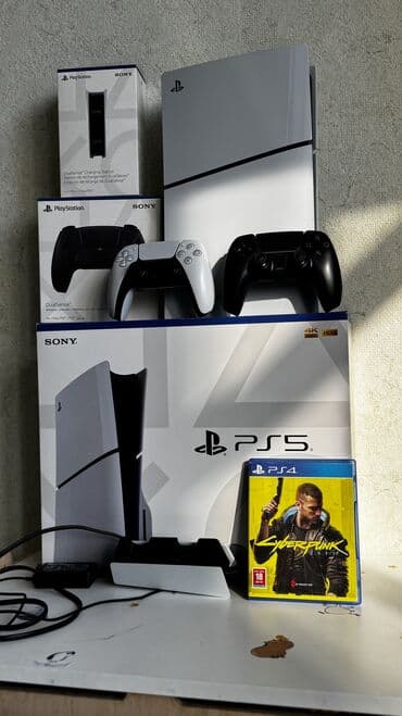 телевизор для плейстейшен 4: Sony PlayStation 5 с зарядкой для джойстиков и скачаными играми — 1